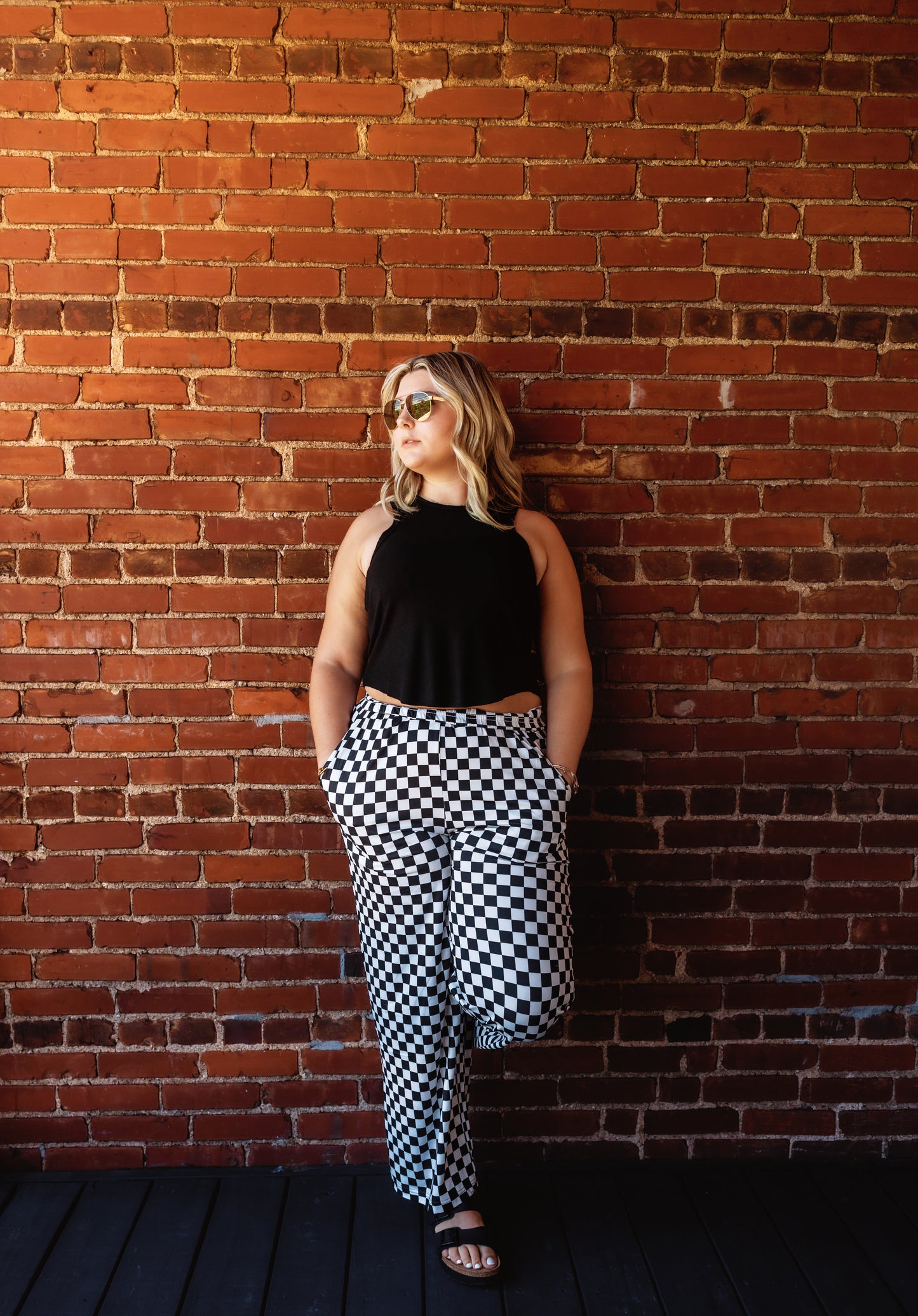 Black & white checkered print Buttery-soft stretch fabric Elastic waistband and Flowy, relaxed leg
