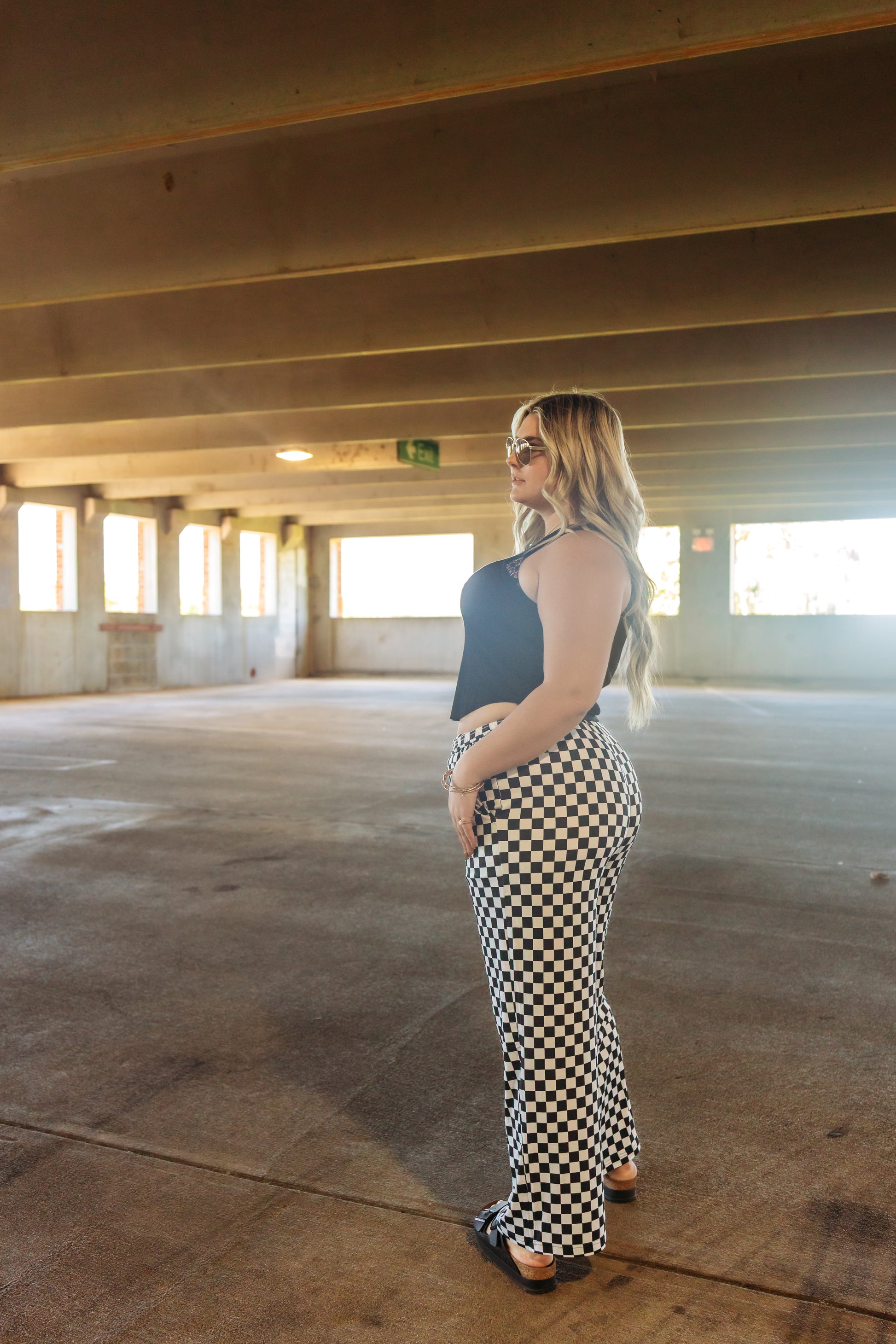 Pants that are black and white checkered. High rise. Stretchy and comfortable. 