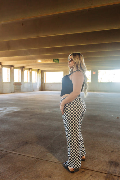Pants that are black and white checkered. High rise. Stretchy and comfortable. 
